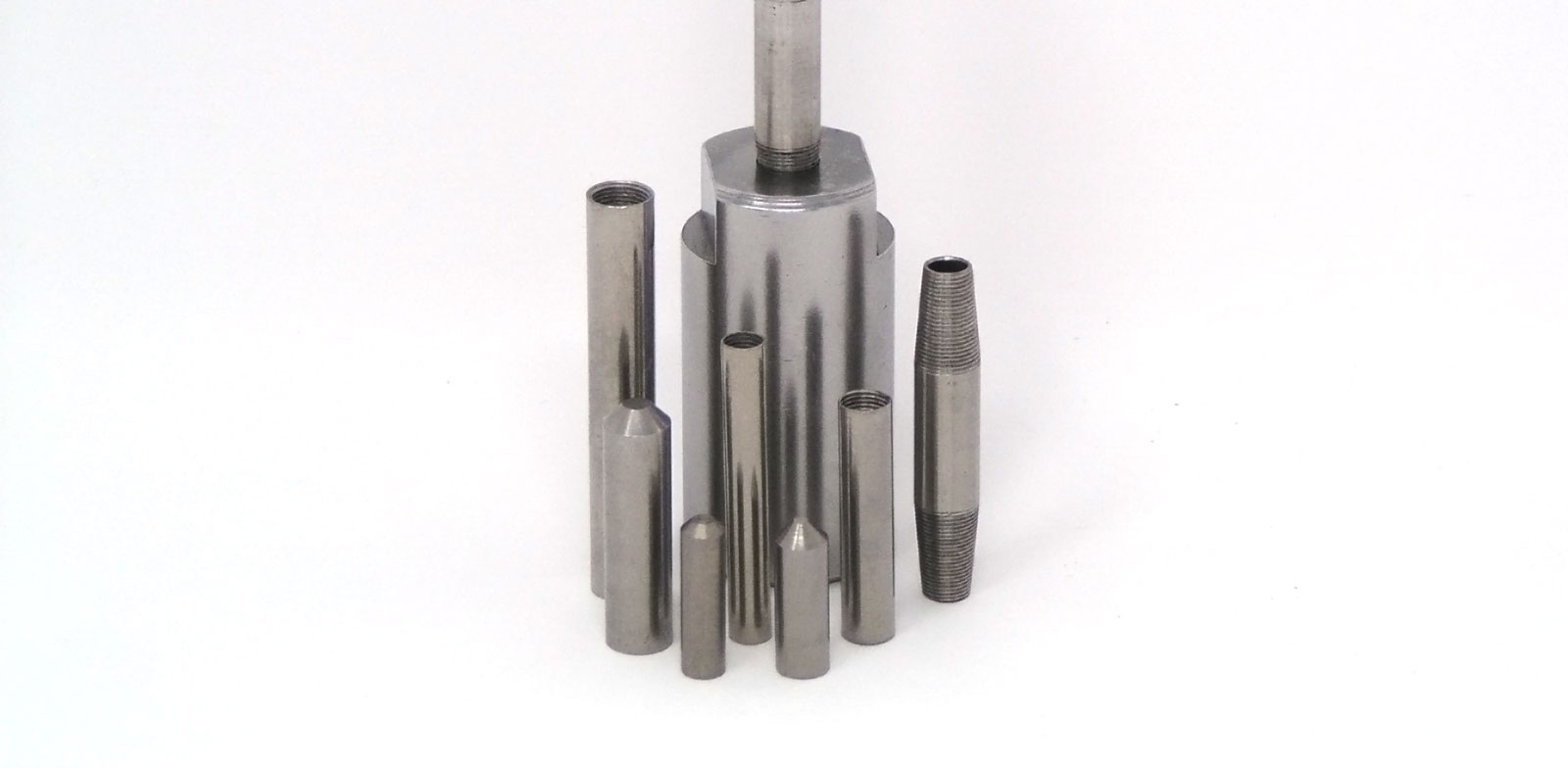 Fixed orifice small profile nozzle used for tube cleaning.